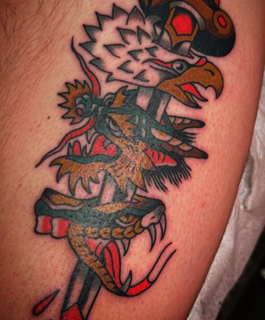 Eagle and dagger tattoo